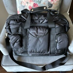 Tommy Bahama Black Travel Bag with Trolly Sleeve